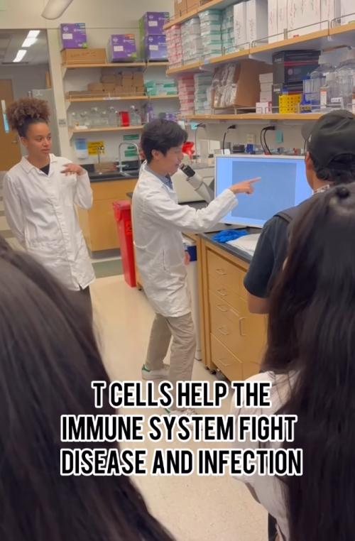 graduate students present to high school students
