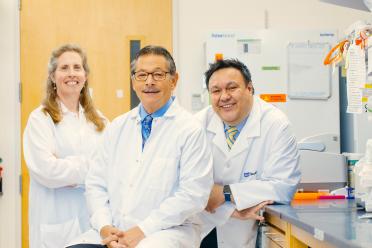 A group photo with Dr. Brigitte Gomperts, Dr. Donald Kohn and Dr. Steven Jonas in the lab