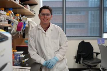 Bridges trainee Cristian Rodriguez in the lab