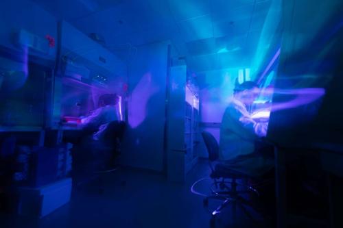 A blue-tinged photograph of lab space at the UCLA Health Jonsson Comprehensive Cancer Center.