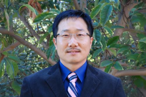 UCLA researcher Yong Kim smiles for a photograph. 