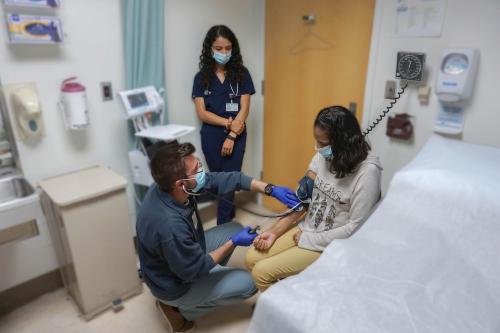 Patient being seen by physician