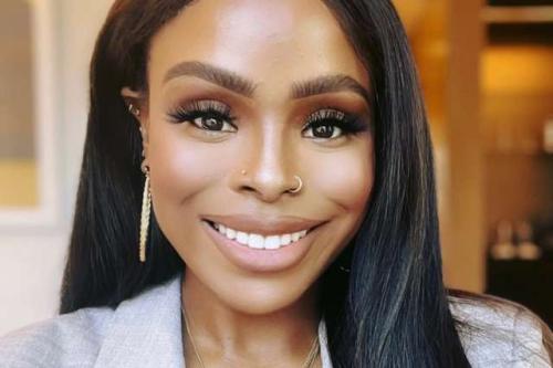 Chandra Wallace smiles for a photograph. 