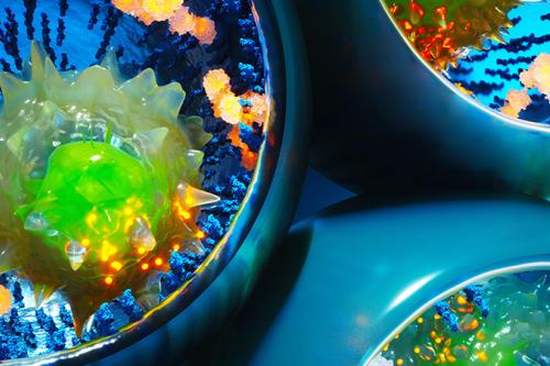 An image of T cells shown interacting with synthetic receptors on UCLA-developed nanovials, inducing secretion of molecules