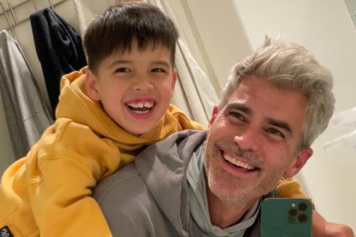 Jeffrey Randall Allen smiles with his son Lucas, who has creatine transporter deficiency, in a candid moment highlighting their bond and advocacy for rare disease gene therapy