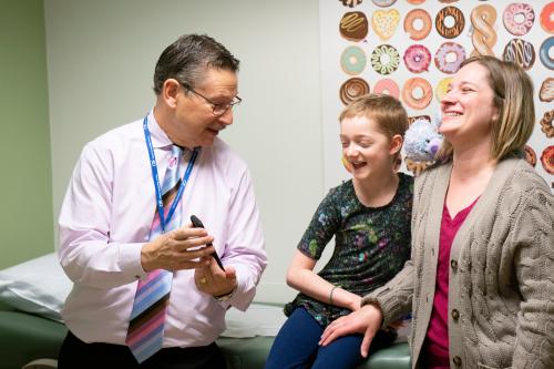 Donald Kohn with clinical trial patient and mom