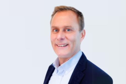 Cédric Blanpain, M.D., Ph.D. smiles for a headshot.