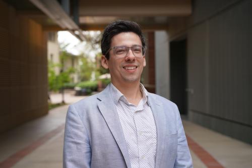 A headshot of researcher Michael Wells on the UCLA campus.