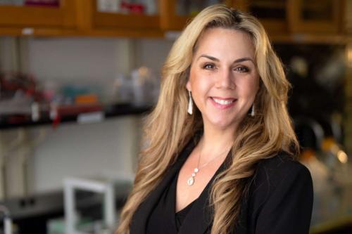 Dr. Tanya Stoyanova smiles in a UCLA lab.