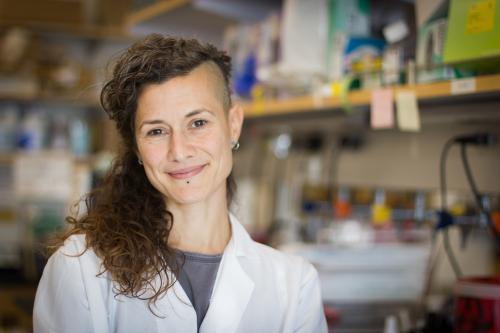UCLA scientist Zulema Romero smiles in the lab.