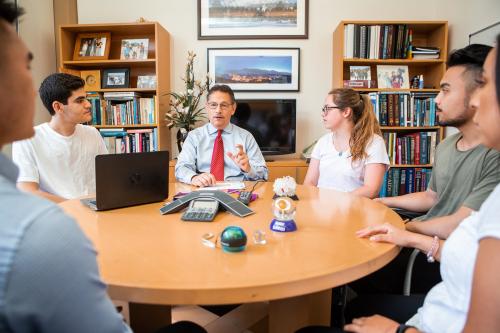 Dr. Donald Kohn meeting with students 