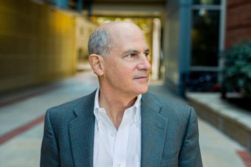 Headshot of BSCRC director Thomas Rando looking to the right outside building