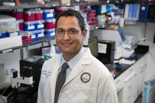 Researcher Dinesh Rao smiles for a photograph