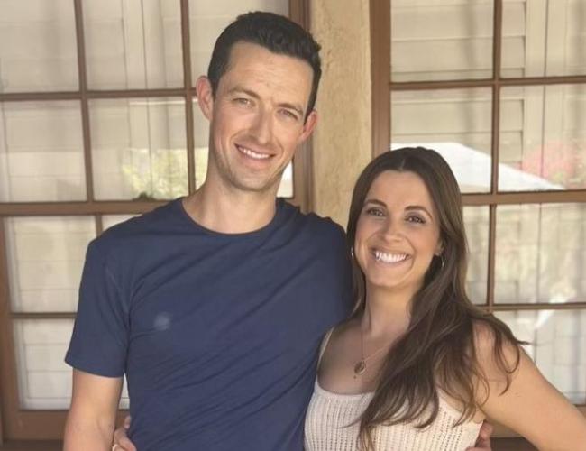 Jon Fields smiles beside his wife, Christina Fields.