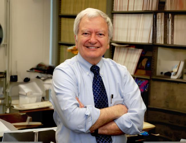 Researcher Michael Jung smiles in a UCLA office.