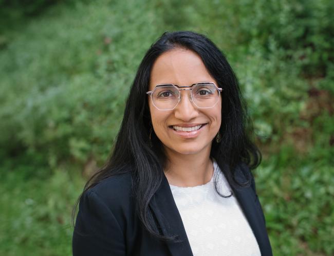 Researcher Aparna Bhaduri smiles for a headshot