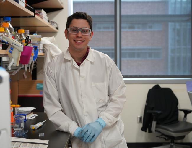 Bridges trainee Cristian Rodriguez in the lab