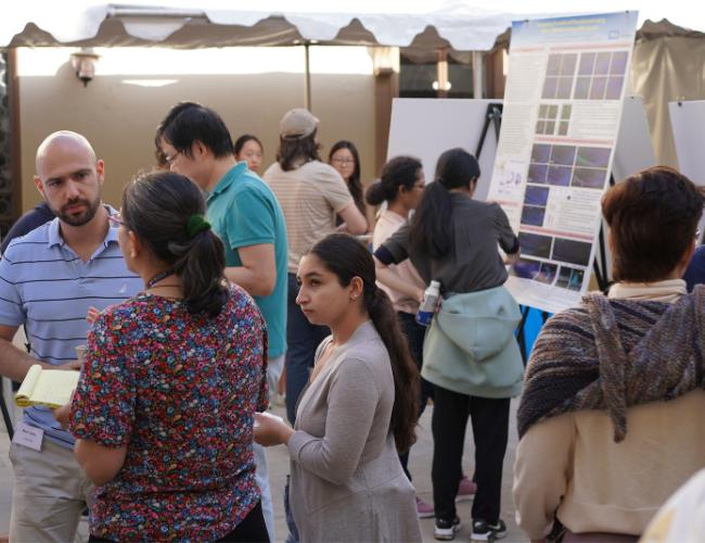 A group of people gather for UCLA BSCRC's EOY Core Resources Event.