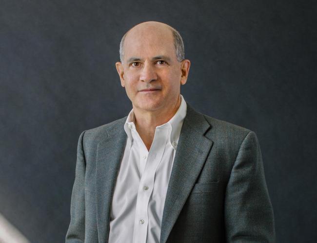 Dr. Thomas Rando appears smiling in a headshot