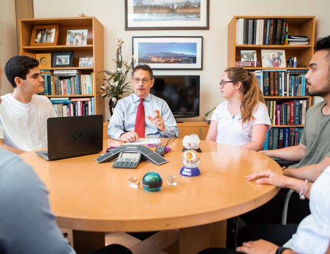 Dr. Donald Kohn meeting with students 
