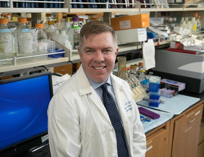 Photograph of John Chute, MD in the lab