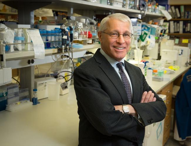 Headshot of Owen Witte crossing arms