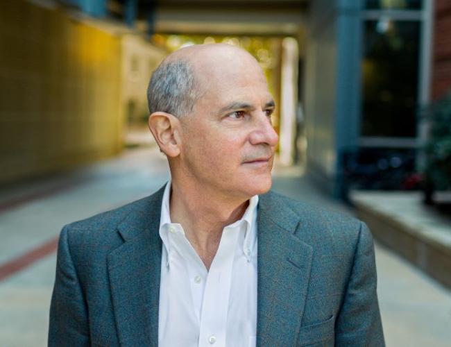 Headshot of BSCRC director Thomas Rando looking to the right outside building