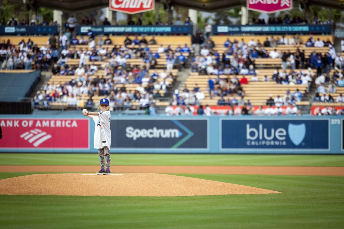 Seersha Sulack eyes the catcher as she prepares to throw out the first pitch. (Photo by Nick Carranza)