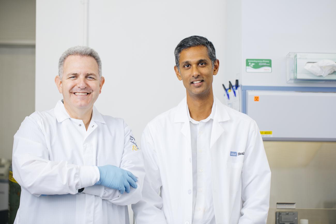 Bennett Novitch and Dr. Ranmal Samarasinghe in a lab