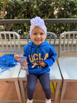Small child Olivia Langenhop wears UCLA gear 