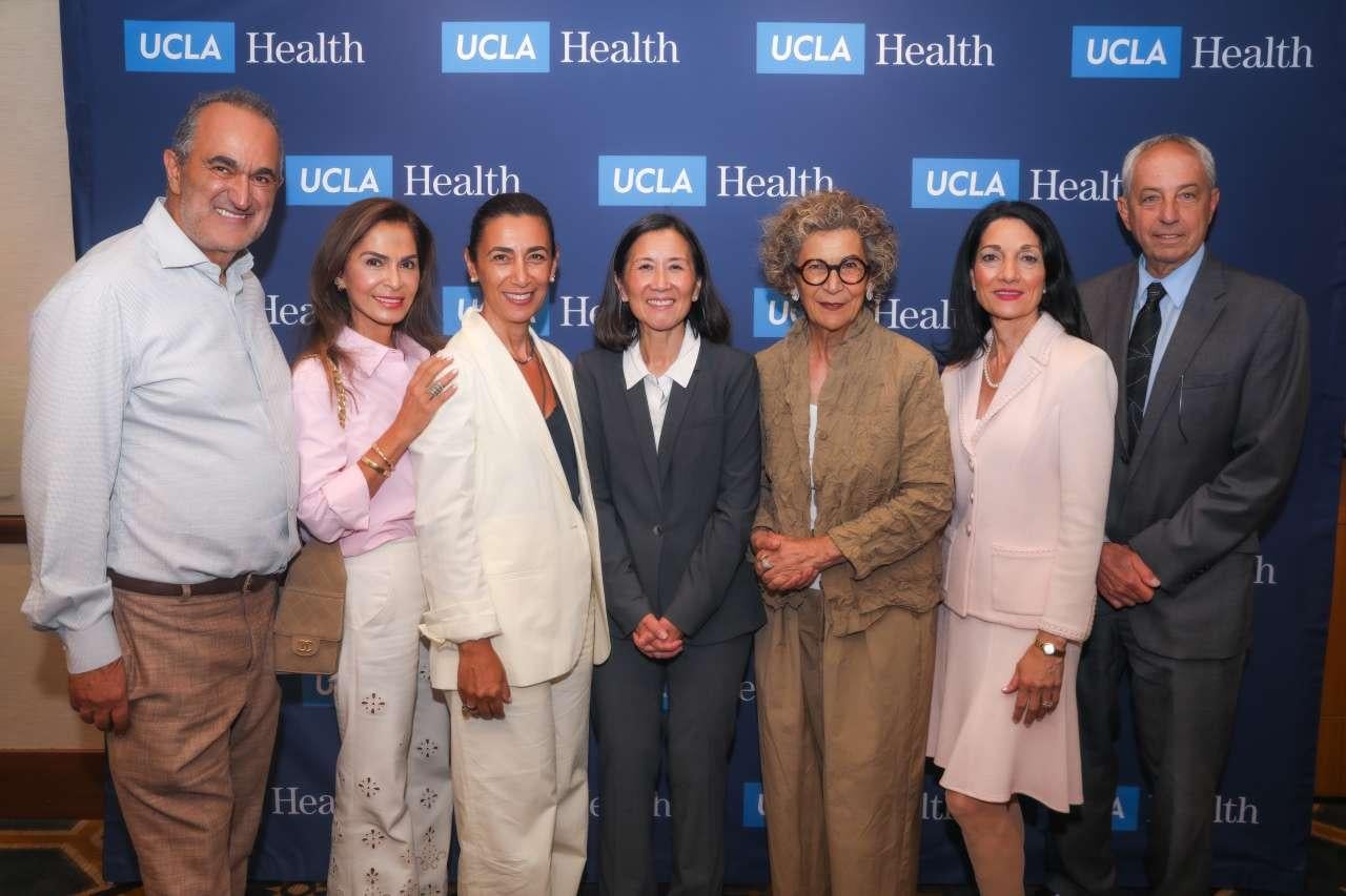 Dr. Linda Liau stands at the center of a group photo from her Nazarian Prize event.