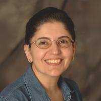 Marlin Touma, M.D., Ph.D. smiles for a headshot