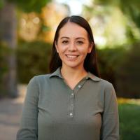 Pearl Quijada smiles for a photograph outdoors. 