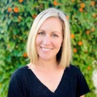 UCLA scientist Julia Mack smiles for a headshot.