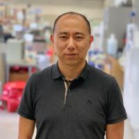 Chongyuan Luo, Ph.D. photographed in a UCLA lab. 