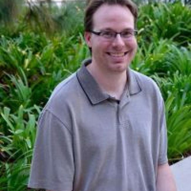 Ambrus, Aaron smiles for a photograph