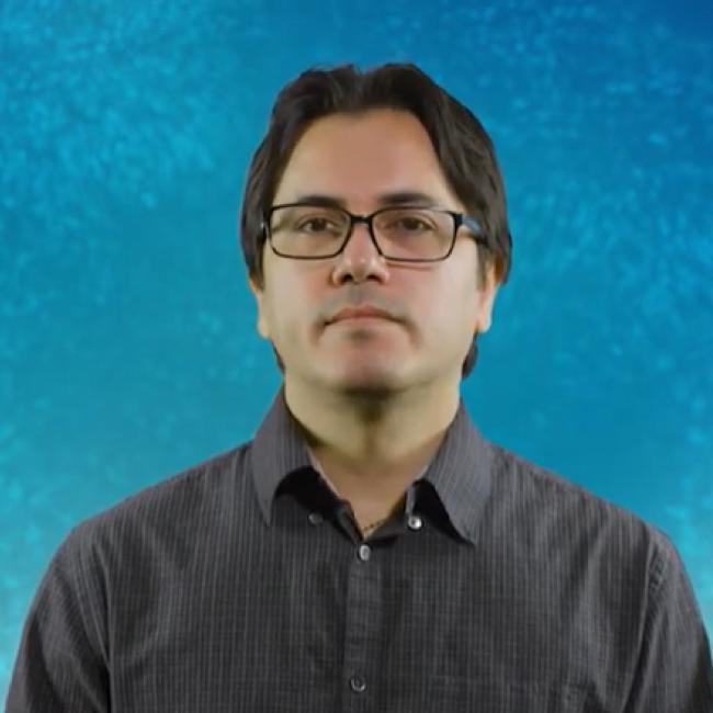 A headshot of researcher Arash Pezhouman, M.D.