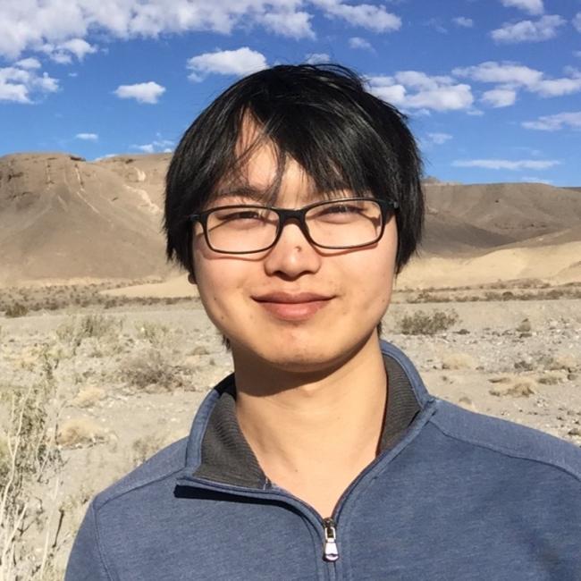 Chi, Fangtao smiles for a photograph.