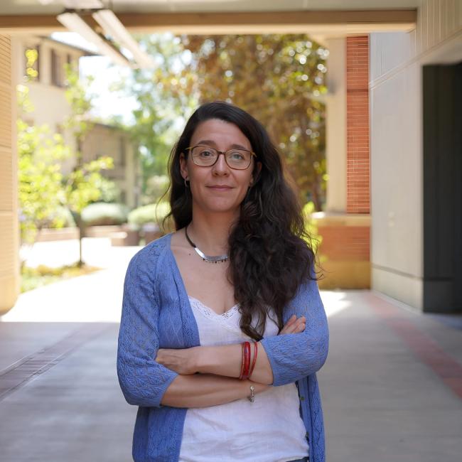 Cristina Puig-Saus smiles for a photograph.
