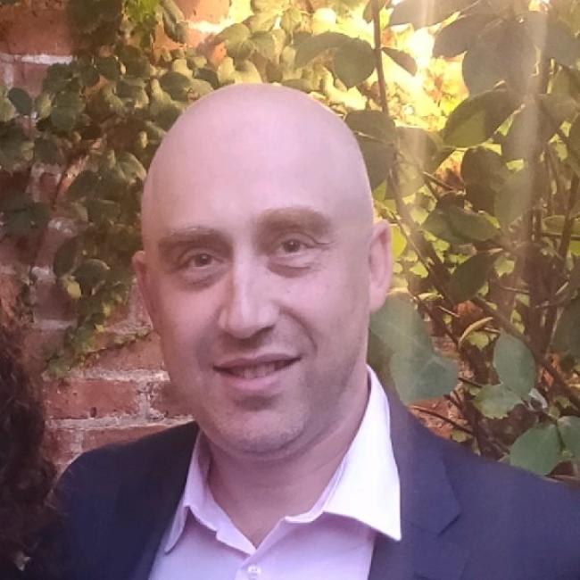 Germanguz, Igal smiles for a photo.