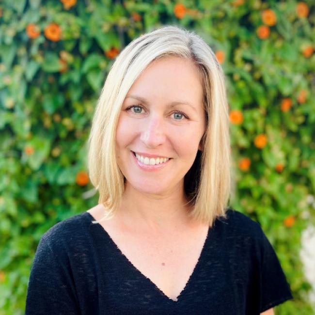 UCLA scientist Julia Mack smiles for a headshot.