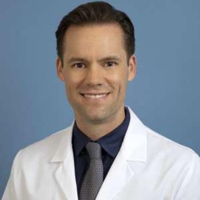 Brian Kadera smiles in a headshot.