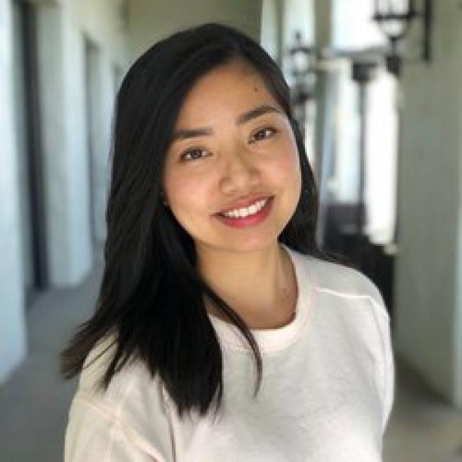 Lu, Vivian smiles for a headshot