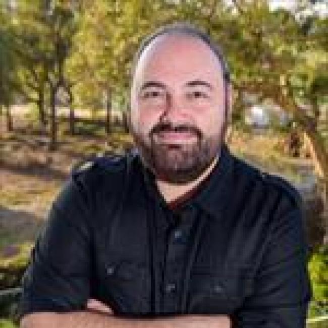 Matthew Shtrahman smiles for a photograph.